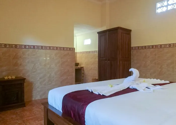 Quarto em Acomodações Particulares Mulan Dini House